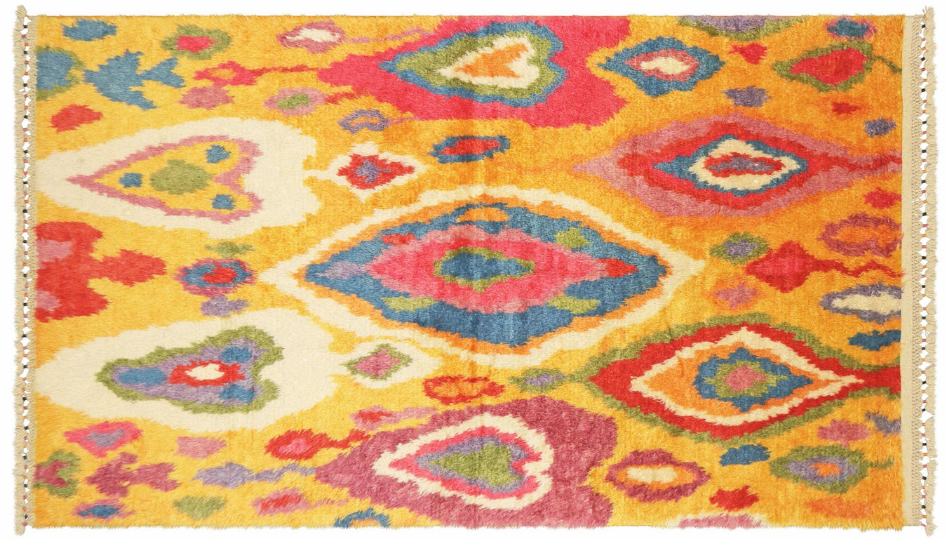 Vintage handwoven shag and tulu rugs in various sizes.