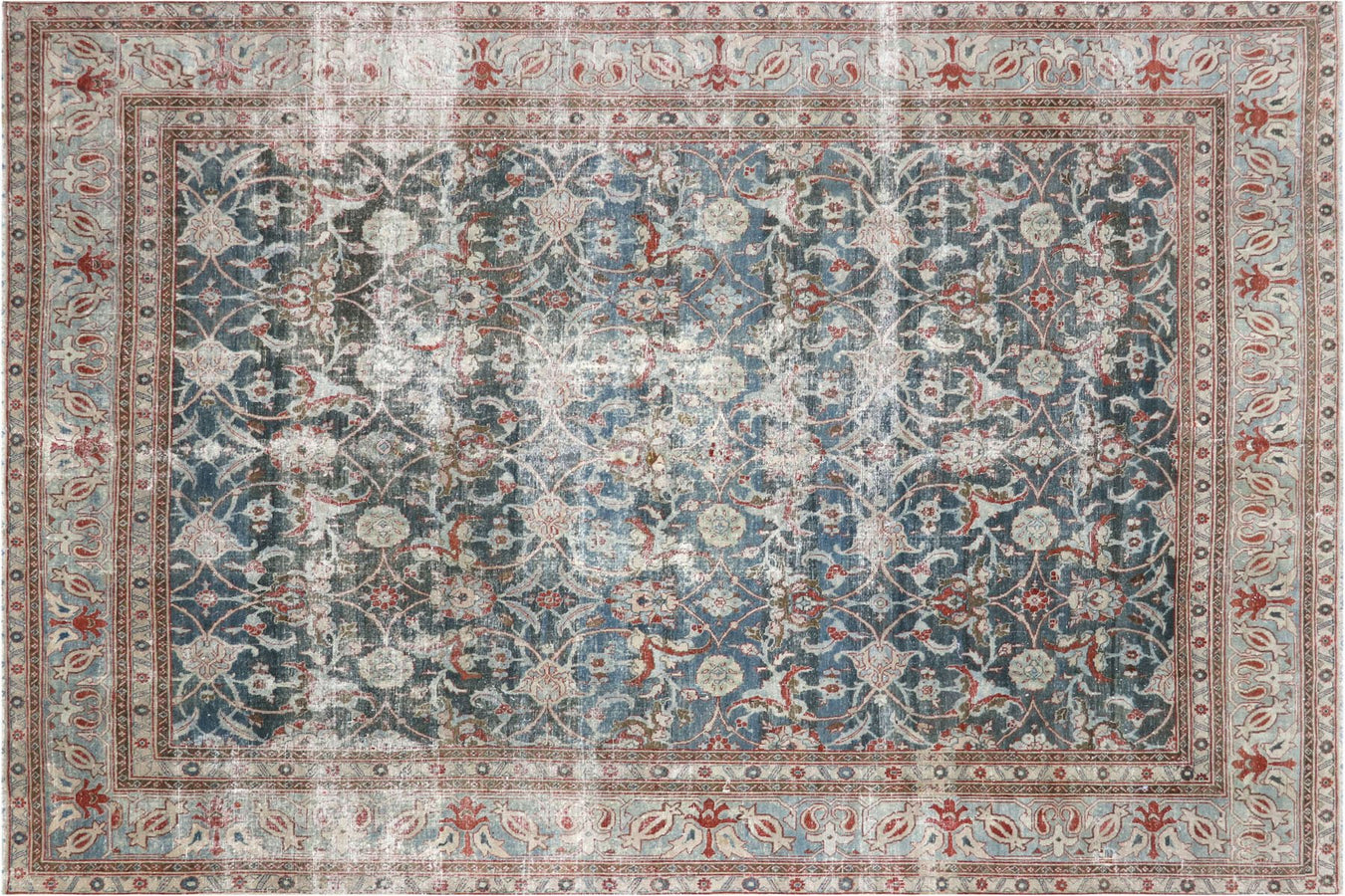Vintage handwoven rugs with traditional and transitional designs that have been manually distressed.