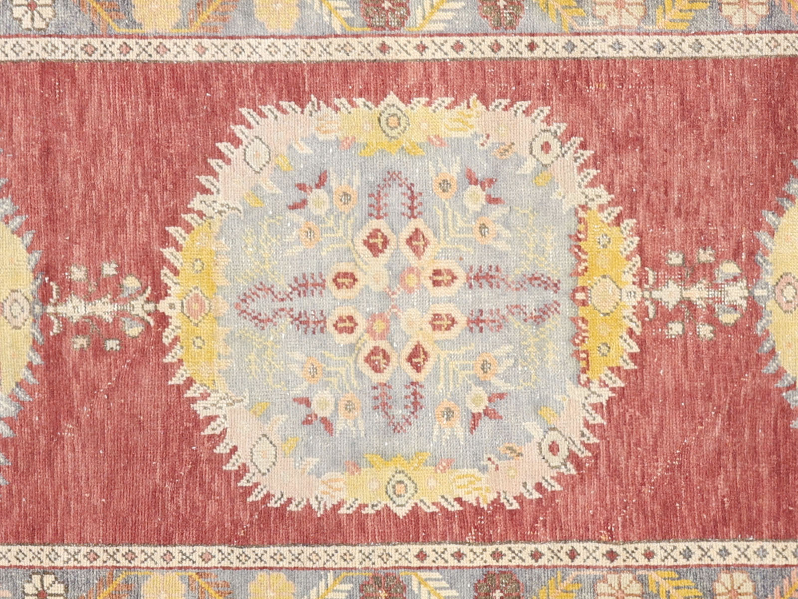 Vintage Turkish Oushak Rug in Red tones and an Medallion pattern. Measuring 3 feet 2 inches x 12 feet 7 inches – SKU 150853